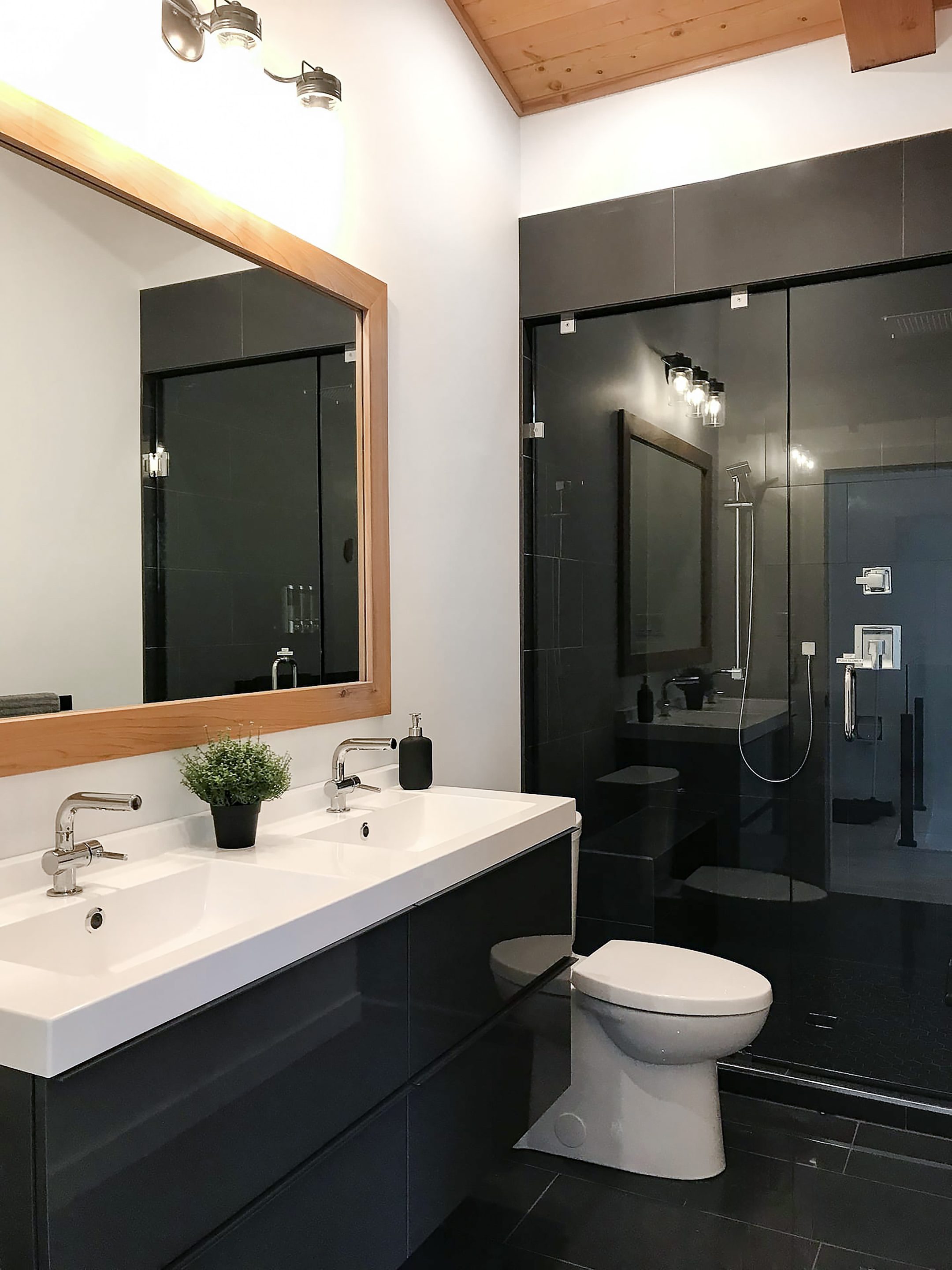 black bathroom with Vancouver island shower door kit from jre hardware